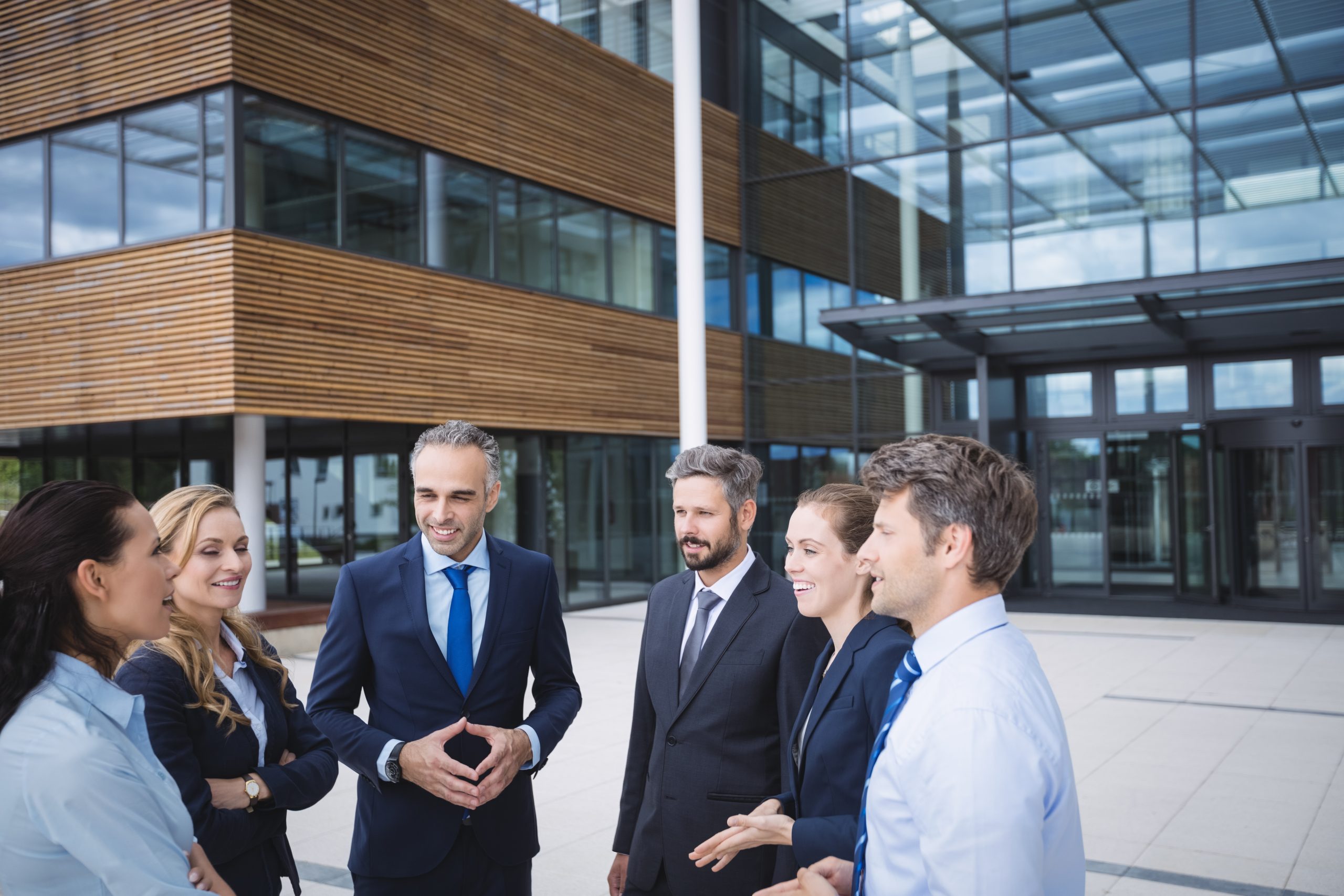 Employees outside an office building